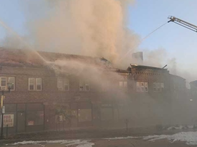 Firefighters responding to fire in Menasha